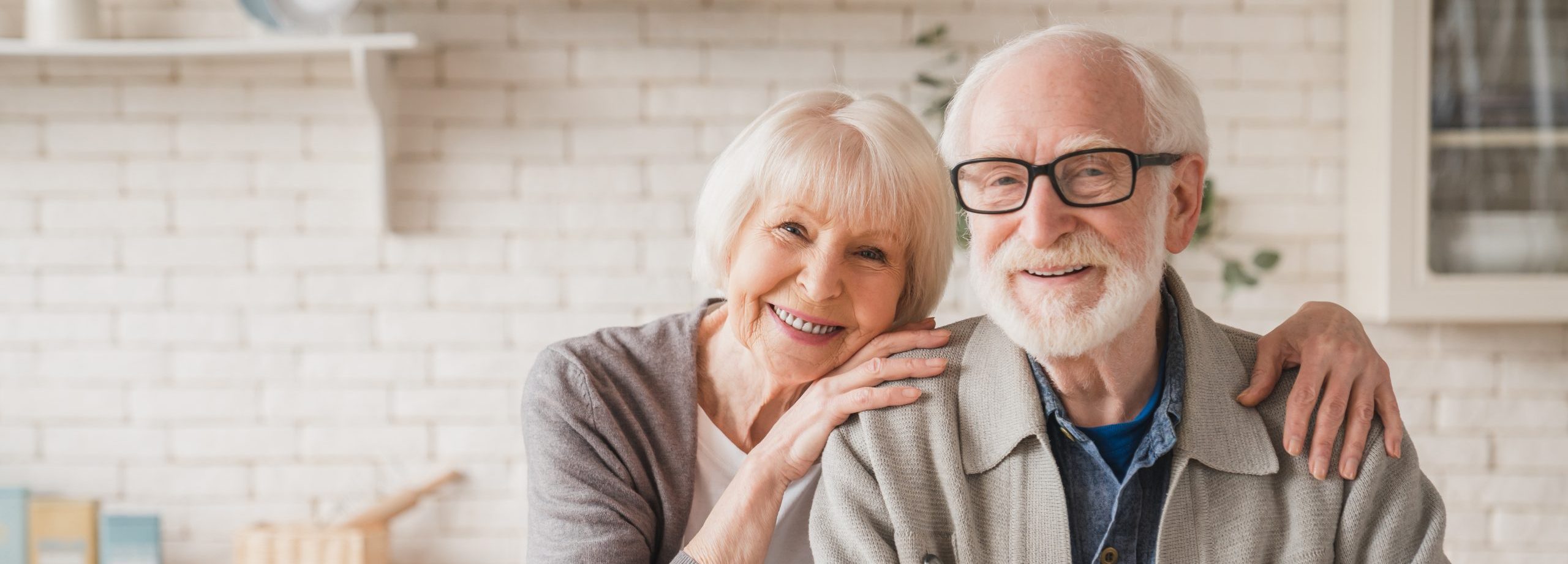 Old Couple smiling at camera