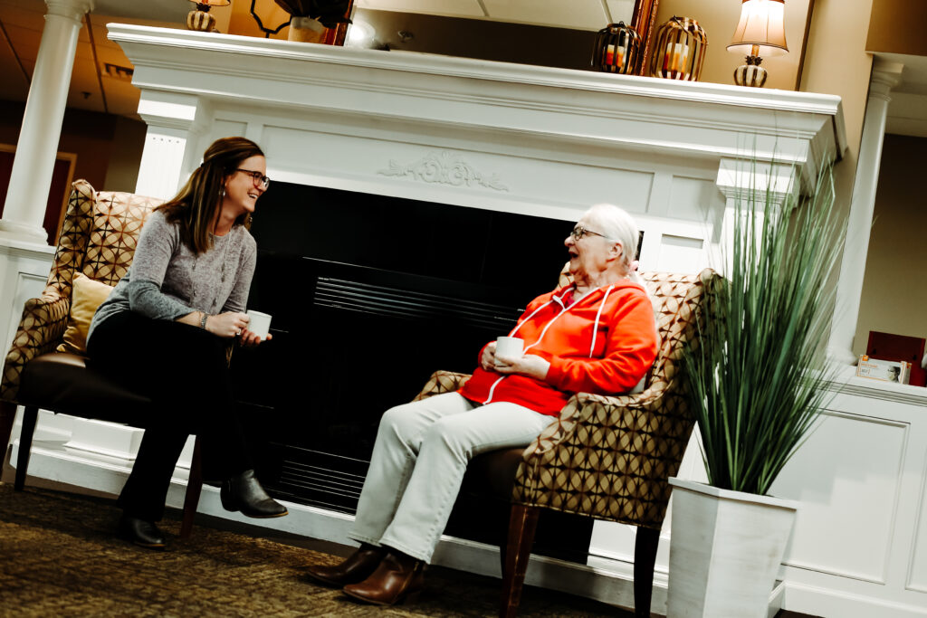 Elderly women sitting with a women