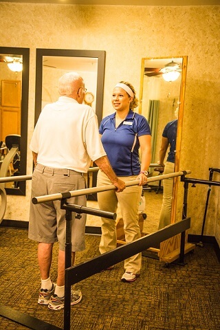 Elderly man with trainer